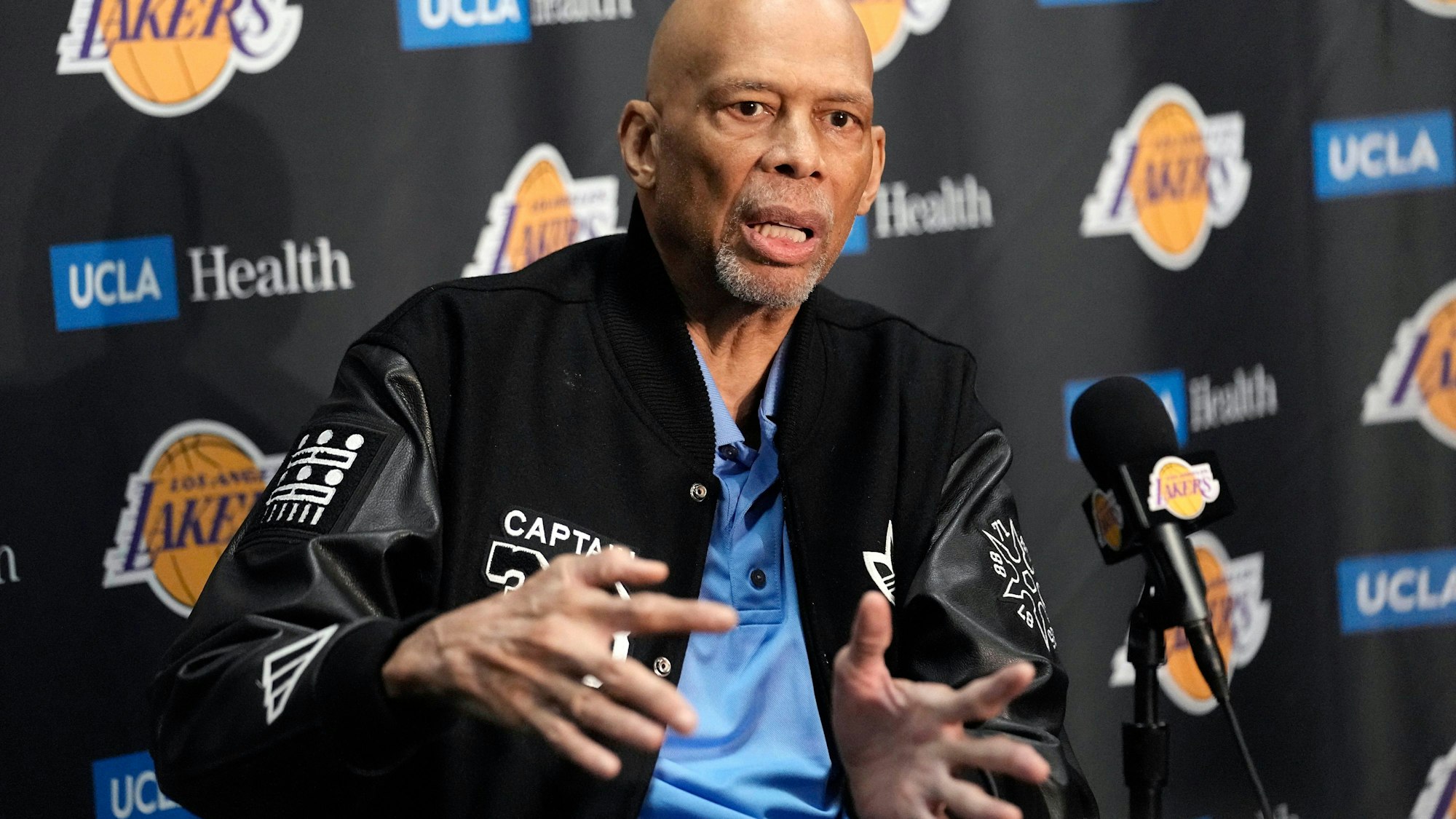 Kareem Abdul-Jabbar speaks during a news conference prior to an NBA basketball game between the Los Angeles Lakers and the Milwaukee Bucks Thursday, Feb. 9, 2023, in Los Angeles. Kareem Abdul-Jabbar fell at a concert in Los Angeles and broke his hip. The NBA Hall of Famer was attending a show Friday night Dec. 15, 2023 when he was injured. Paramedics at the undisclosed venue responded and the 76-year-old was transported to a hospital for treatment. (AP Photo/Mark J. Terrill)