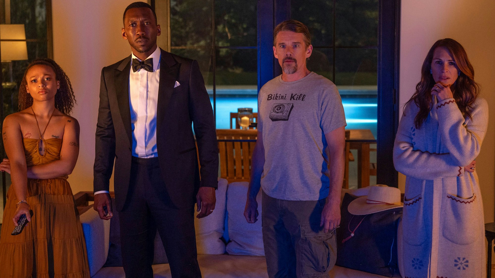 This image released by Netflix shows Myha'la Herrold, from left, Mahershala Ali, Ethan Hawke and Julia Roberts in a scene from "Leave the World Behind." (Netflix via AP)