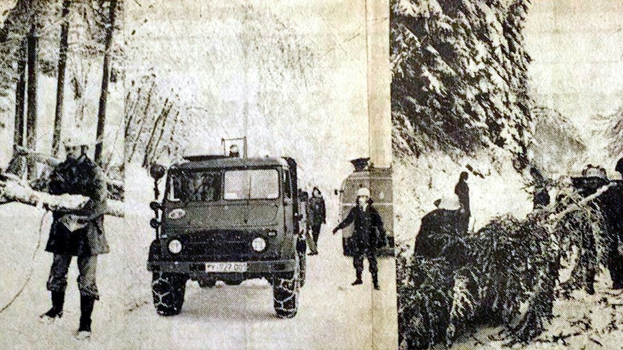 Alte Fotos zeigen Einsatzkräfte im Schnee, die Bäume wegräumen.