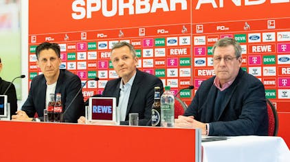 Christian Keller (v.l.), Philipp Türoff und Werner Wolf äußern sich auf einer Pressekonferenz des 1. FC Köln
