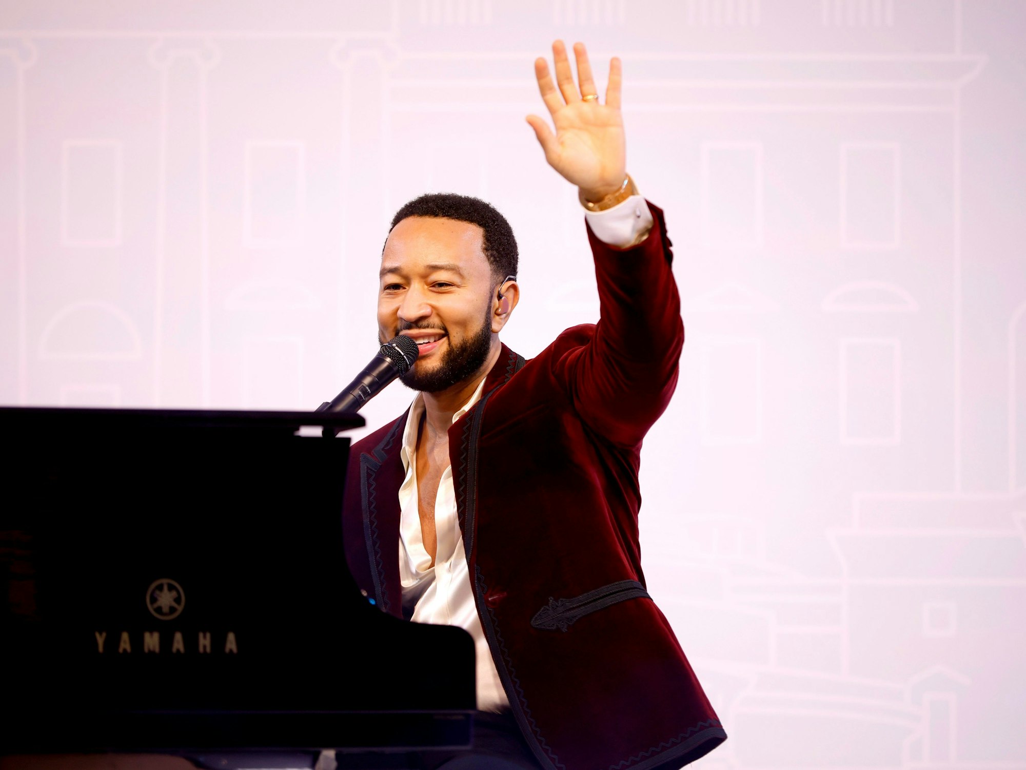 WASHINGTON, DC - DECEMBER 16: John Legend, multiplatinum artist, producer and EGOT winner shares his passion for music with Hilton Honors members during a live performance at Waldorf Astoria DC on December 16, 2022 in Washington, DC. The exclusive event highlights the one-of-kind packages available on the Hilton Honors Experiences platform. (Photo by Tasos Katopodis/Getty Images  for Hilton Honors)
