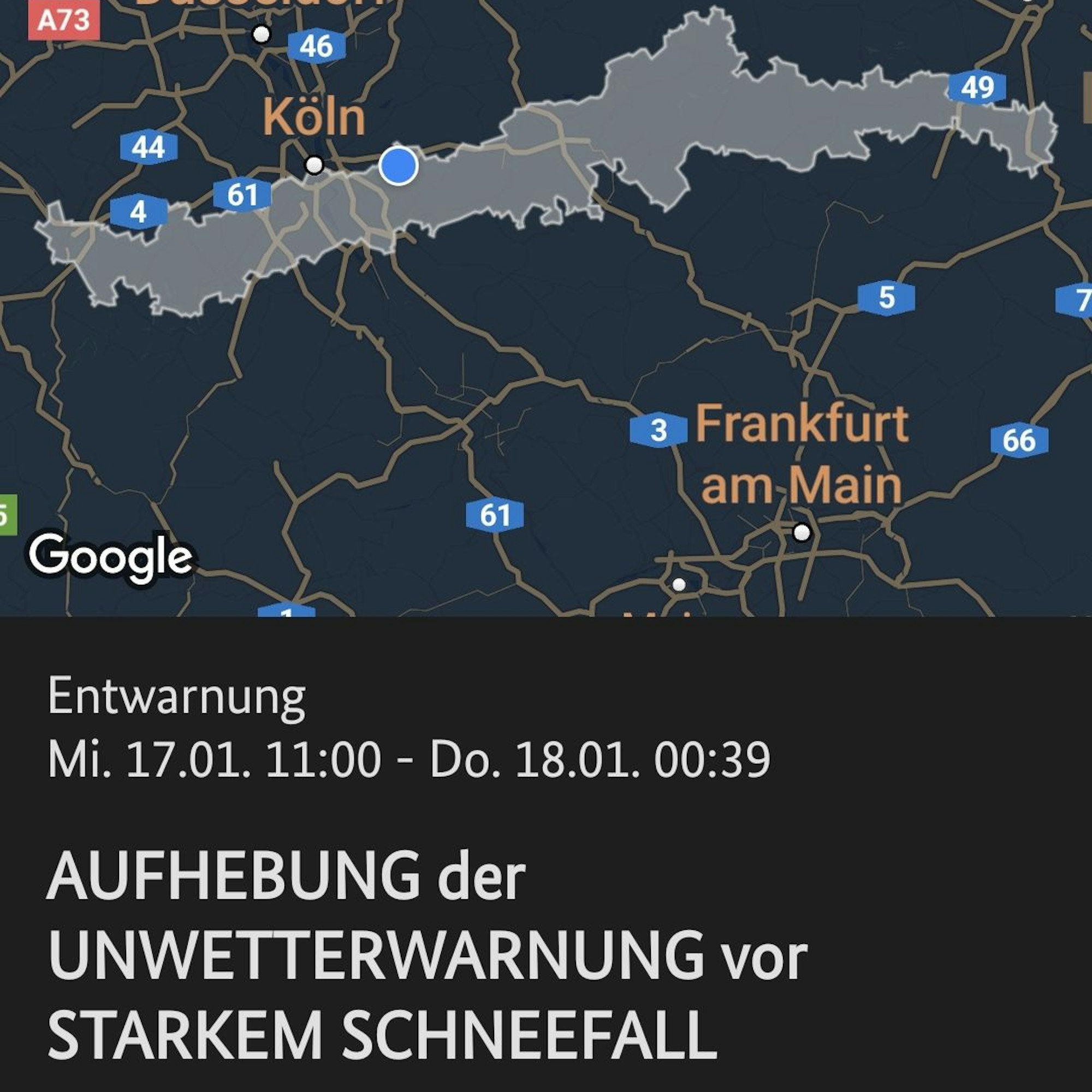 Ein Bildschirm zeigt eine Karte und die Aufschrift „"Entwarnung. Aufhebung der Unwetterwarnung vor starkem Schneefall"“
