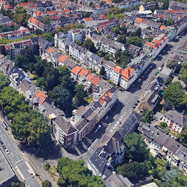 Der Ehrenfeldgürtel (links im Bild) und die Nußbaumer Straße (rechts) auf einer 3D-Ansicht, die aus Google Earth generiert wurde.&nbsp;