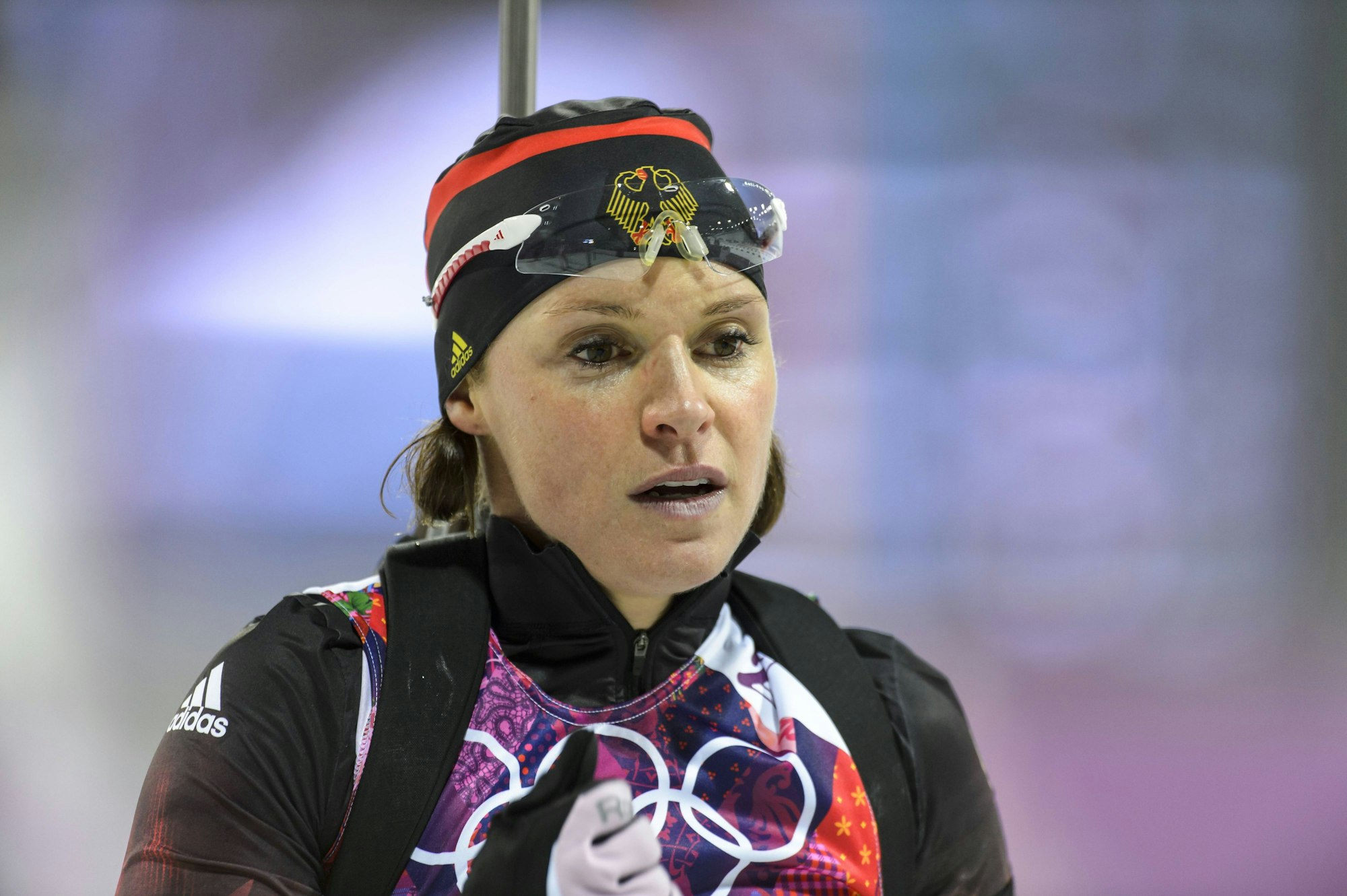 Evi Sachenbacher-Stehle im Ziel nach dem 12,5 km-Massenstart bei den Olympischen Spielen 2014.