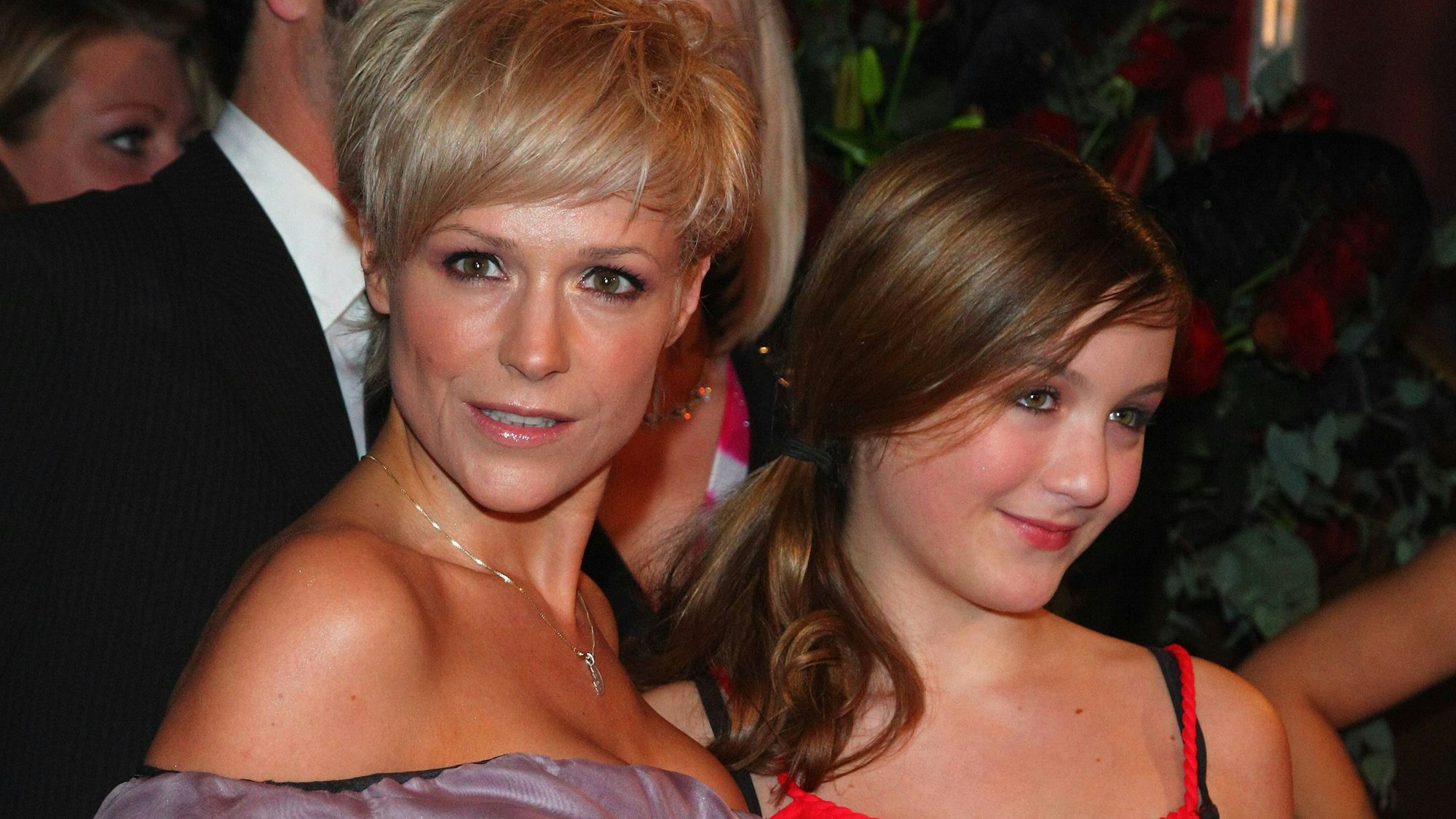 Michelle mit Tochter Céline bei einer Party im Februar 2010.