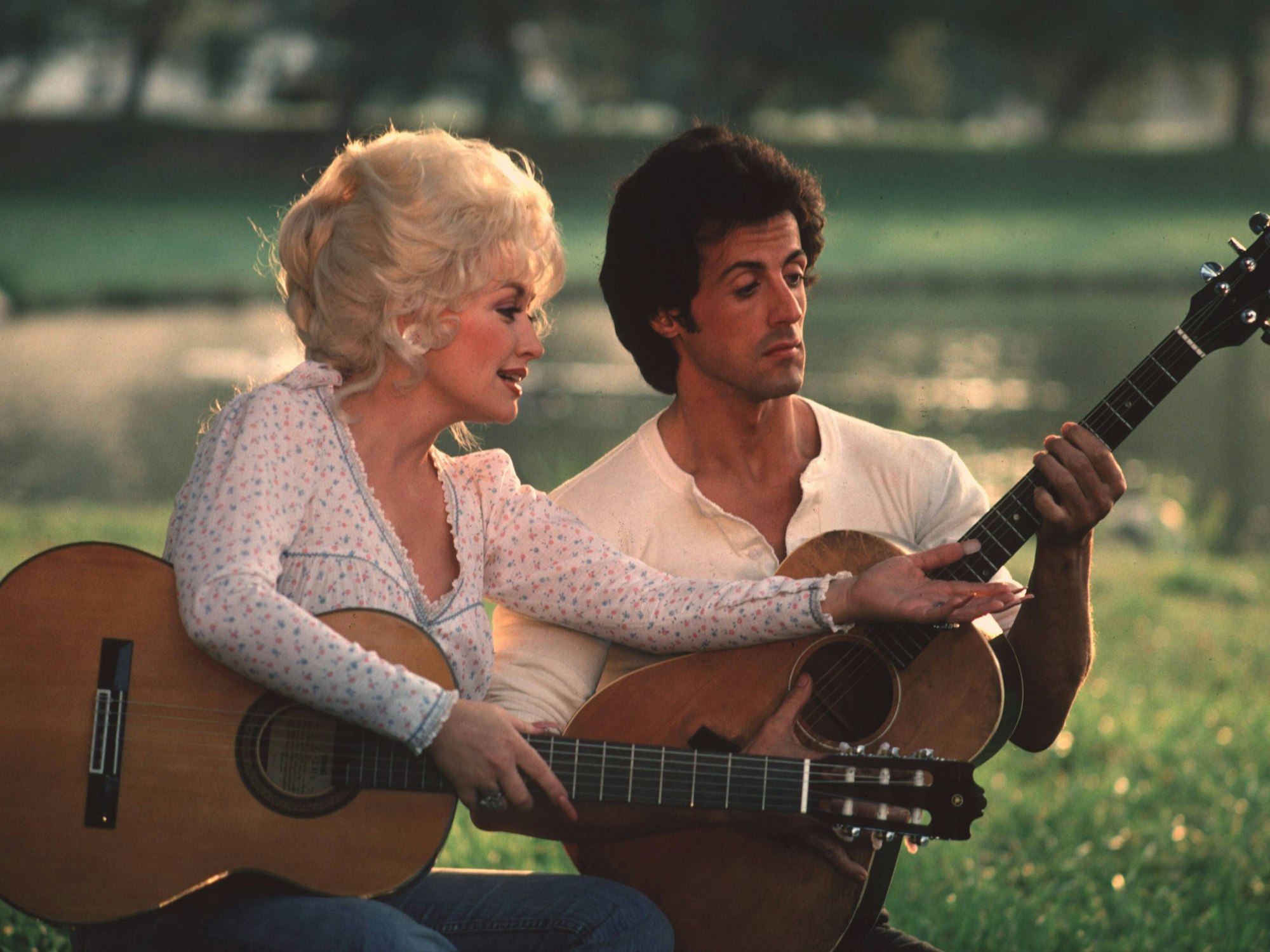 Dolly Parton und Sylvester Stallone 1984 beim Dreh zu "Rhinestone"