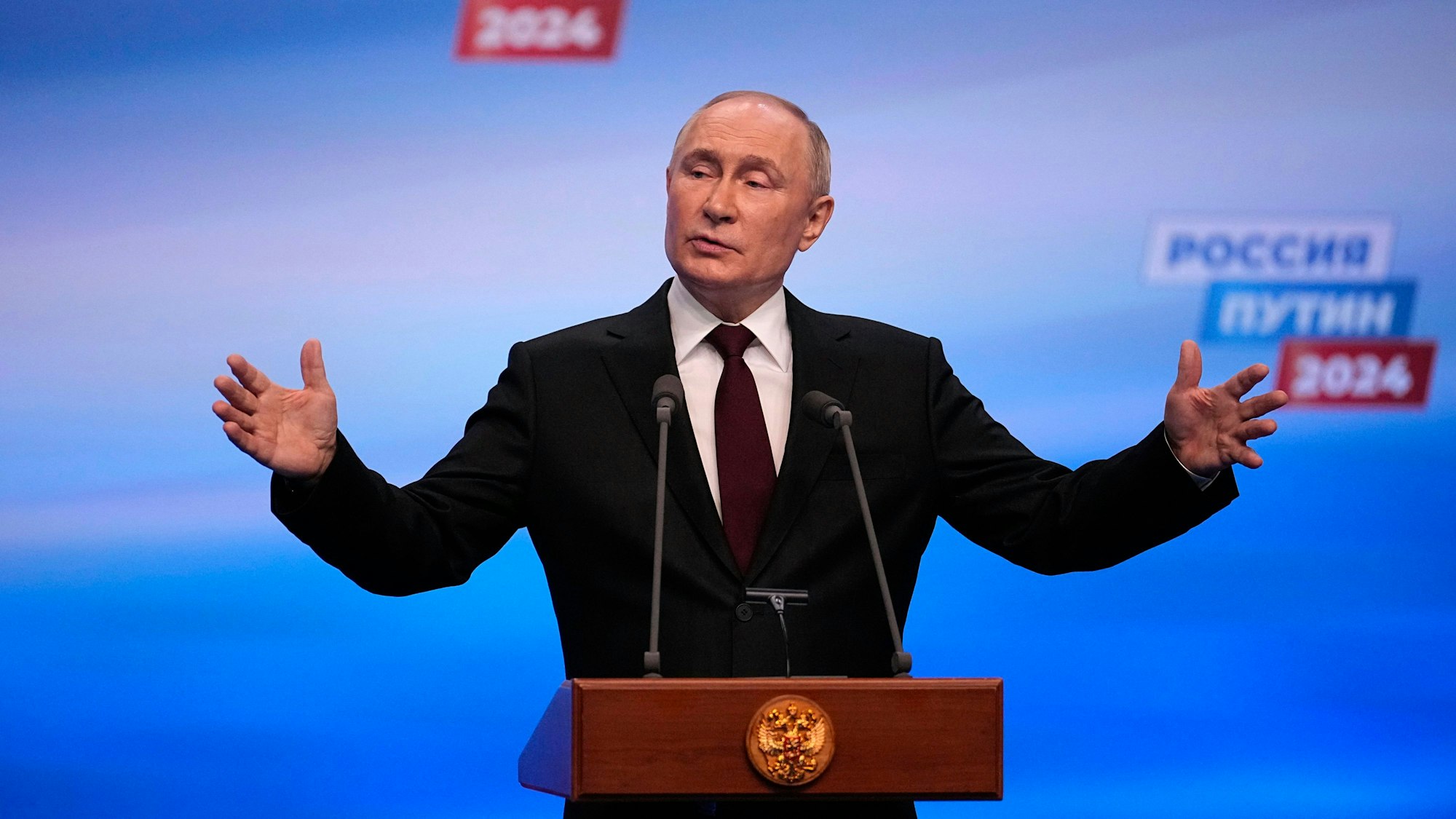 Russian President Vladimir Putin speaks on a visit to his campaign headquarters after a presidential election in Moscow, early Monday, March 18, 2024. (AP Photo/Alexander Zemlianichenko)