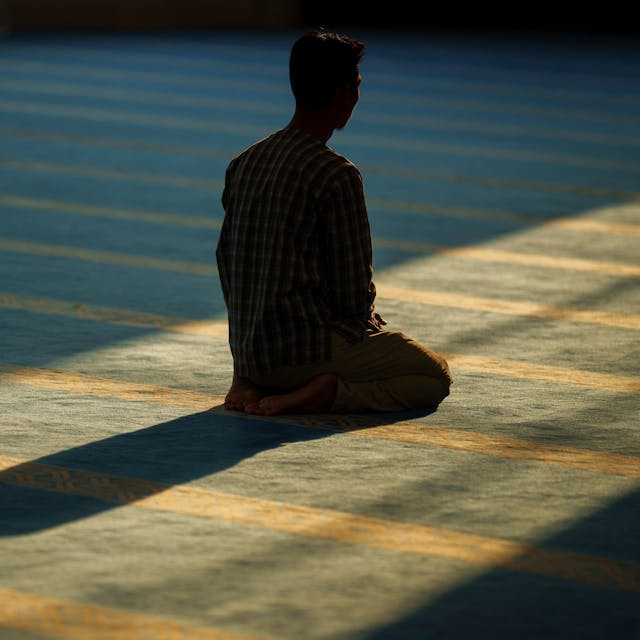 A man prays during the holy month of Ramadan at Sri Sendayan mosque in Negeri Sembilan state