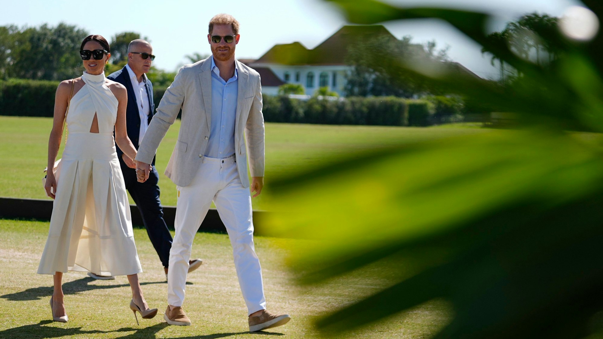 Prinz Harry (r) und Meghan nach ihrer Ankunft bei der Royal Salute Polo Challenge zu Gunsten von Sentebale im USPA National Polo Center.