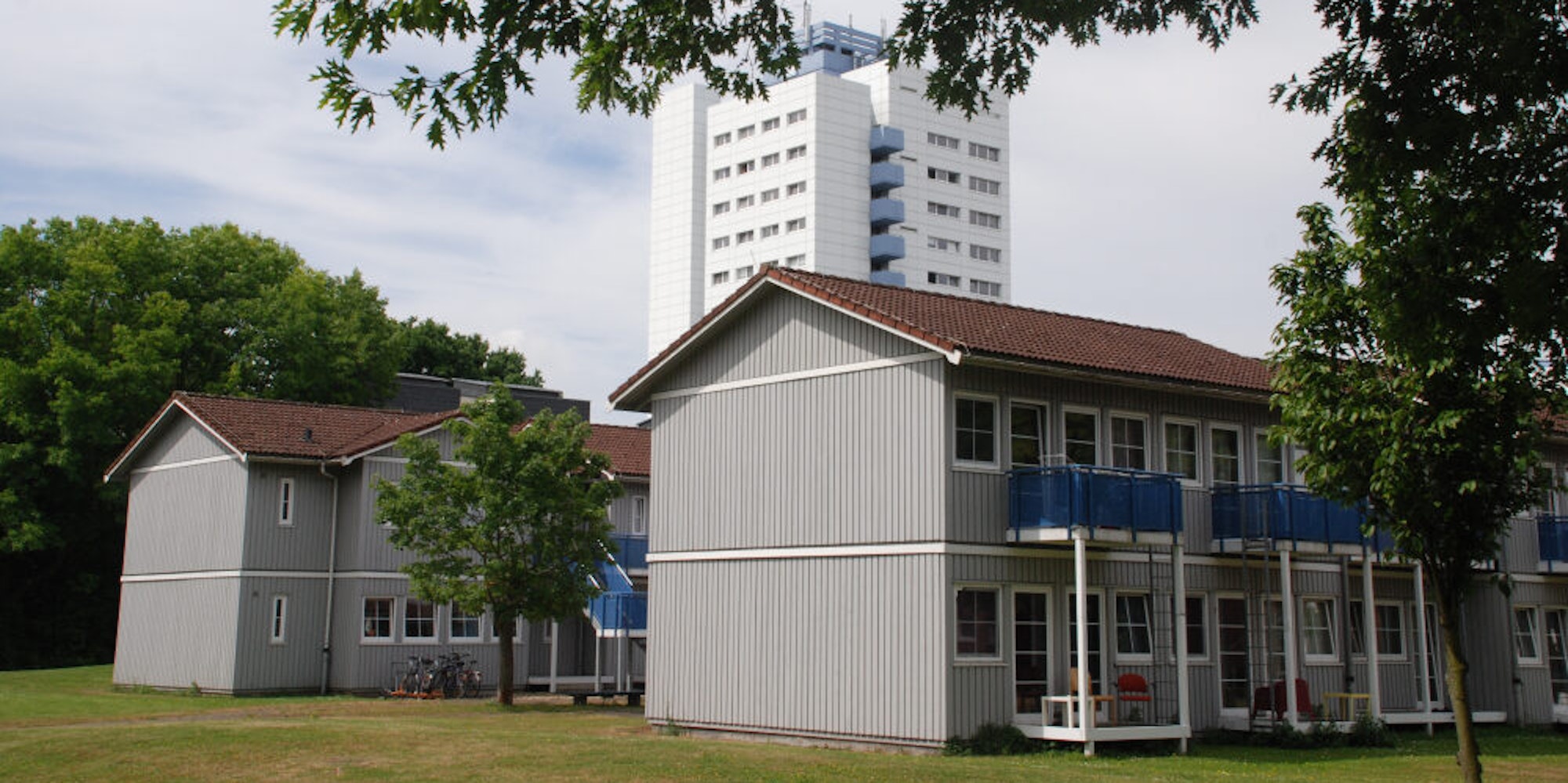 Die Norwegerhäuser auf dem Campus sollen größeren Neubauten mit mehr Plätzen weichen.
