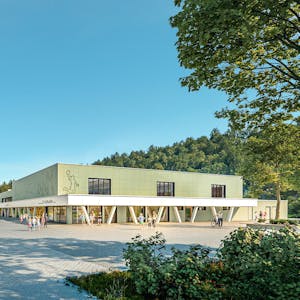 Die Kürtener Schulgebäude (l.) mit der neuen Sporthalle (r.) in der Vision der Planer.