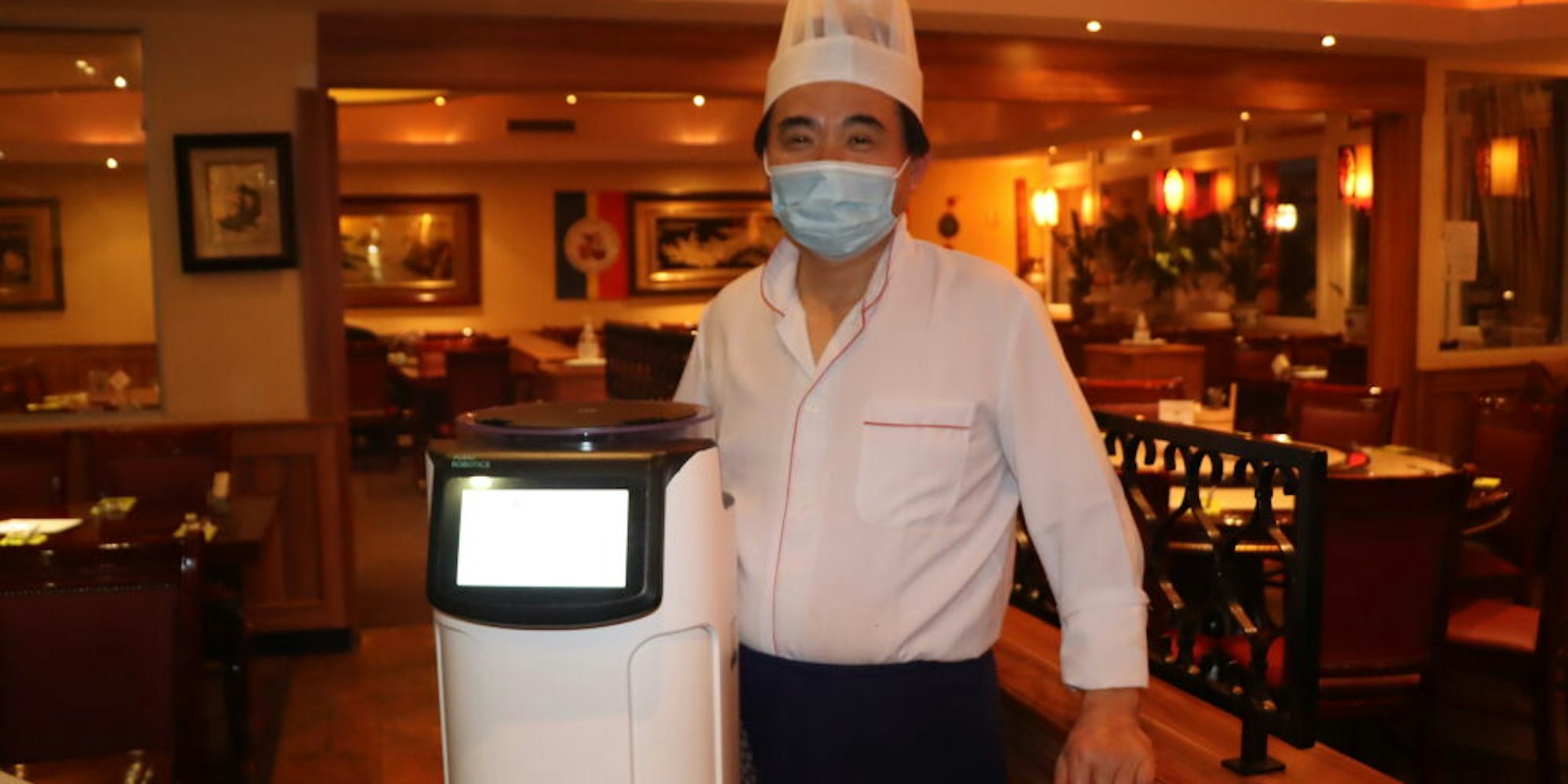 Jin Jian Shu hat die Roboter in China gesehen und nach Deutschland geholt.