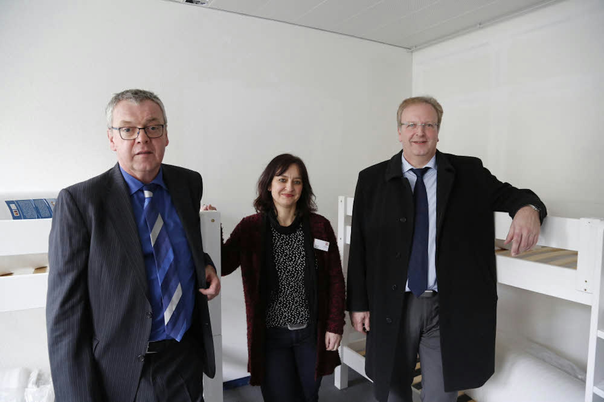 Josef Ludwig  (stellv. Leiter Wohnungsbau Stadt Köln; links), Marina Welch (Ko­or­di­na­to­ren Diakonie Mi­chaels­ho­ven), Uwe Ufer (Vorstand Diakonie Mi­chaels­ho­ven).