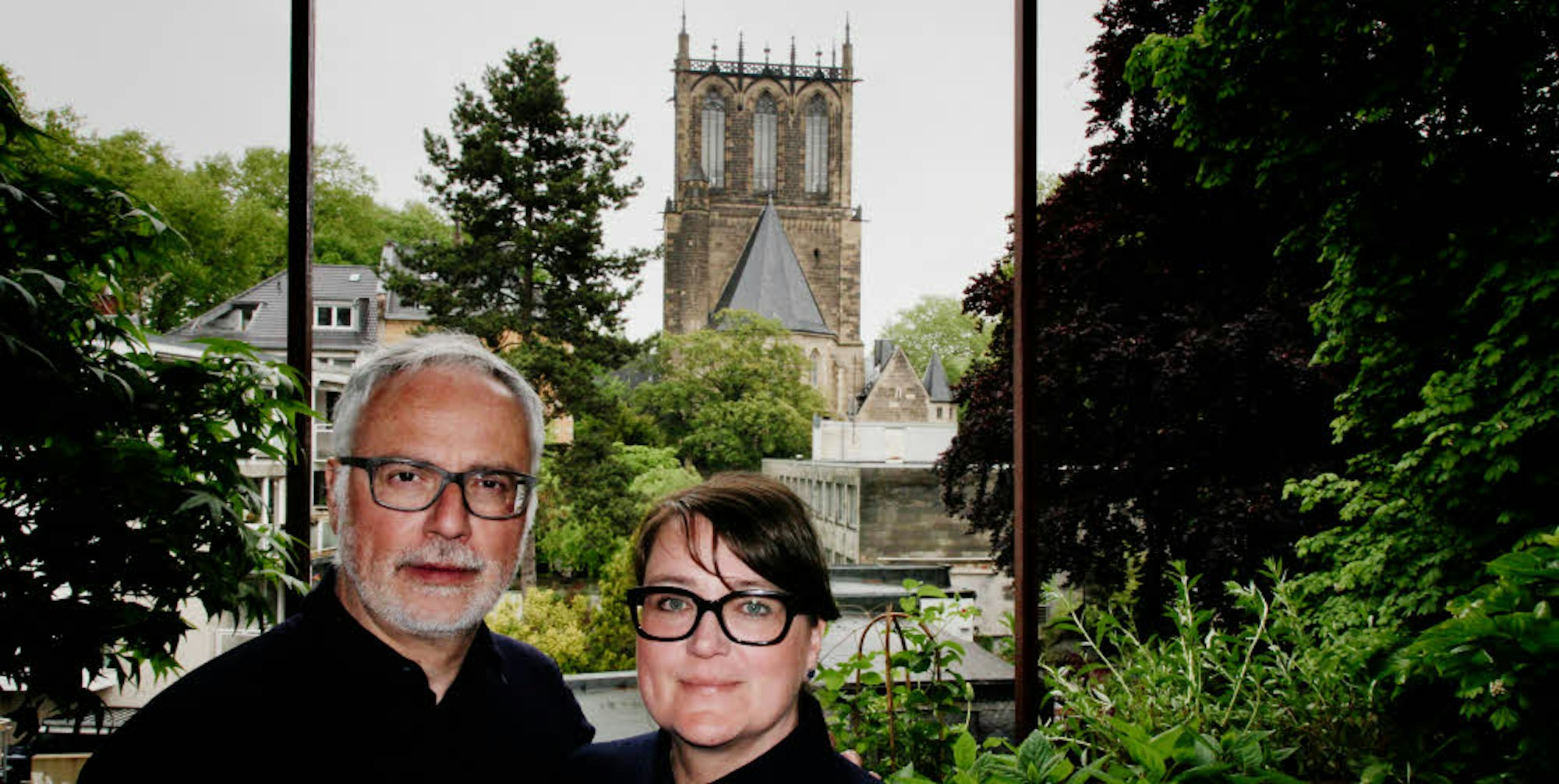 Thomas und Ariane Waldschmidt fürchten um ihre unverstellte Aussicht auf die Pauluskirche.