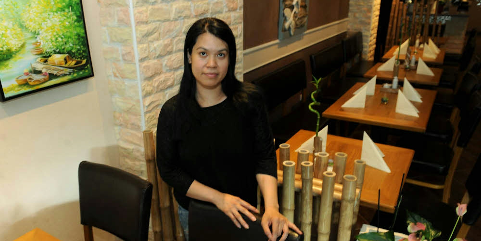 Betreiberin Thi Lua Pham in ihrem kürzlich eröffneten Restaurant „Kim Ly“.