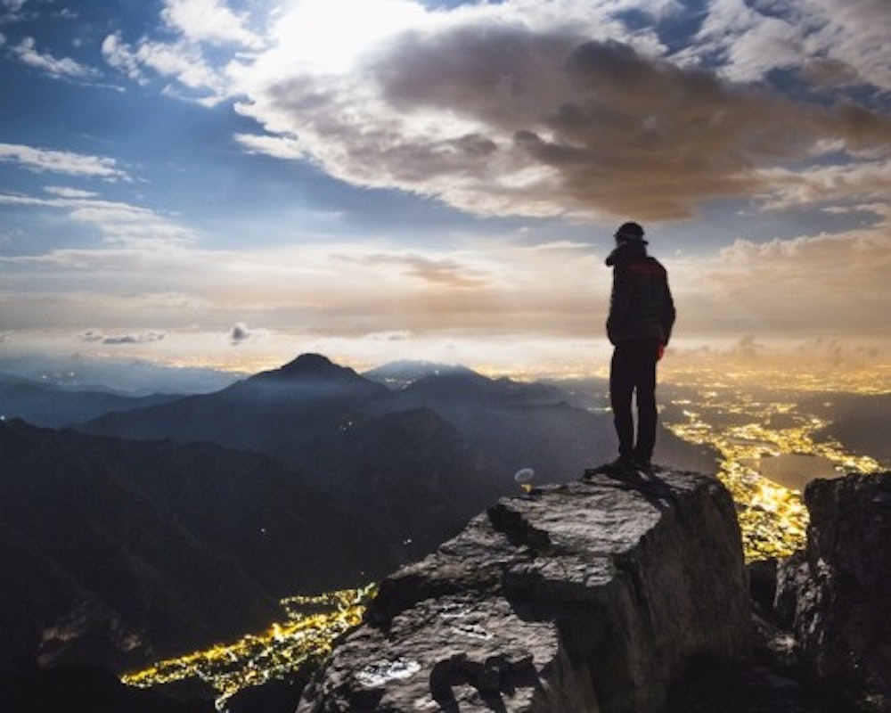hiker-on-top-of-the-mountain-deimage-massimo-colombo-01_gettyimages-593303002-500x400-50-50