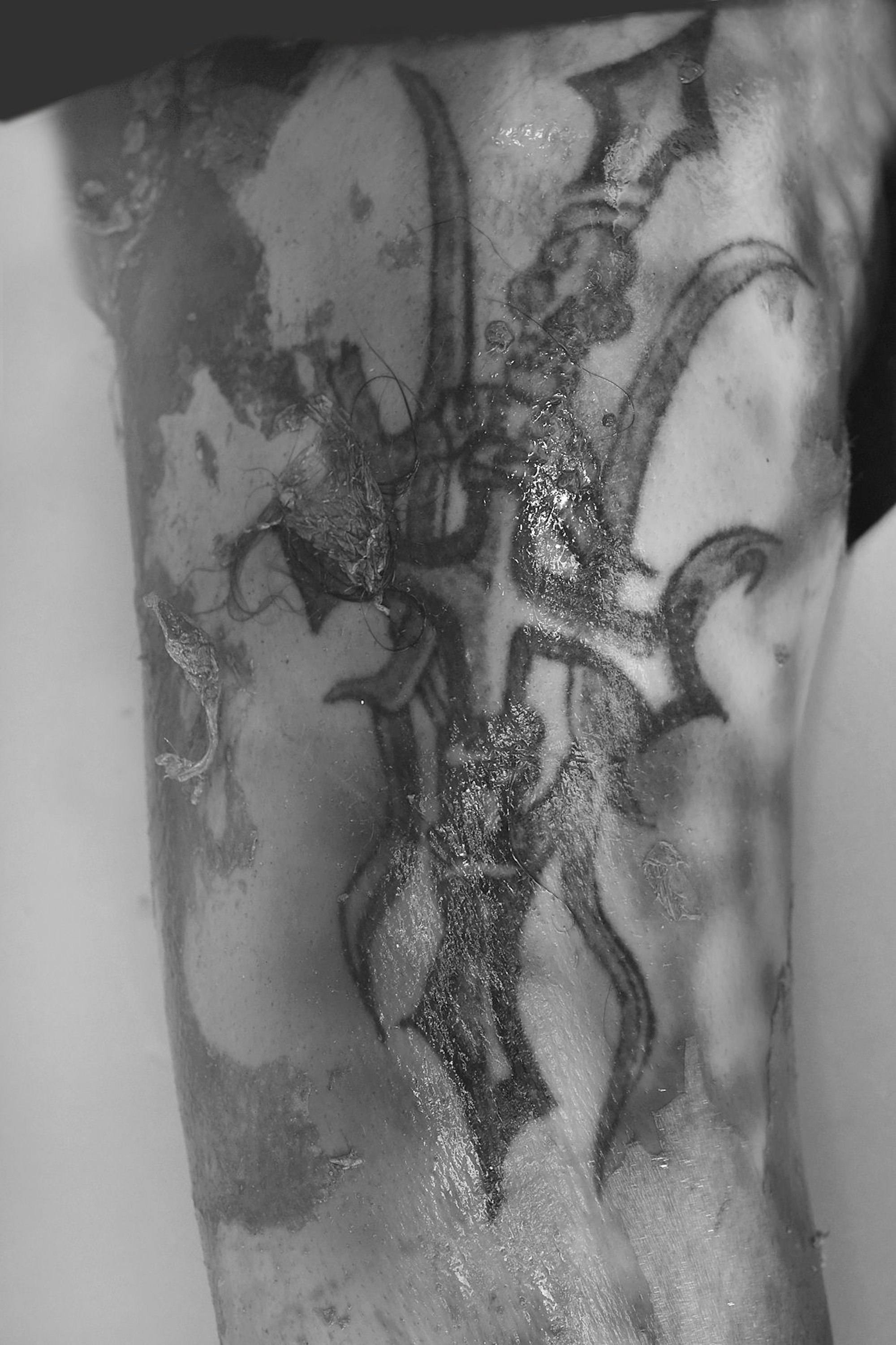 Tattoo-Mann Oberarm rechts 170612