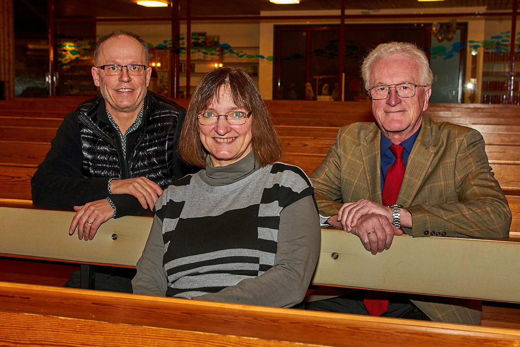 Im Dienst der Gemeinde: Pfarrer Rolf Theobold (l.), Manguela Fokuhl und Henning Schützendorf sind im Presbyterium tätig.