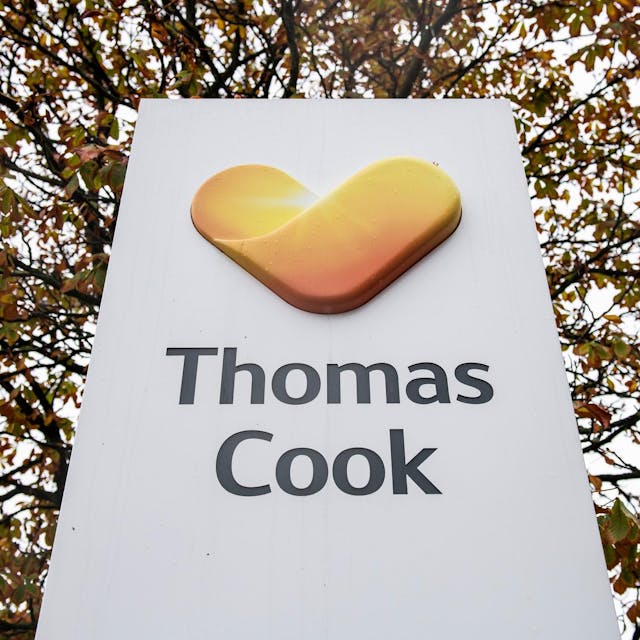 Thomas Cook Logo vor Bäumen