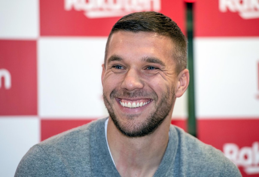 Lukas Podolski lächelt